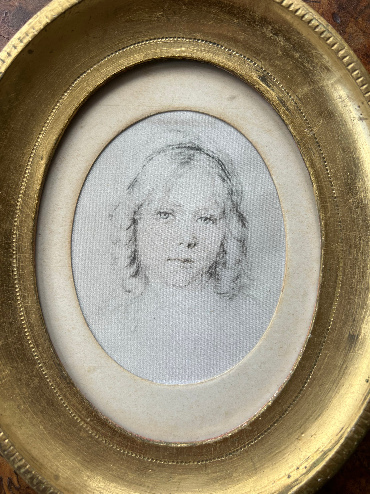 Pair of Vintage Rene David Portrait Prints on Silk, in Mid Century Florentine Giltwood Oval Frames