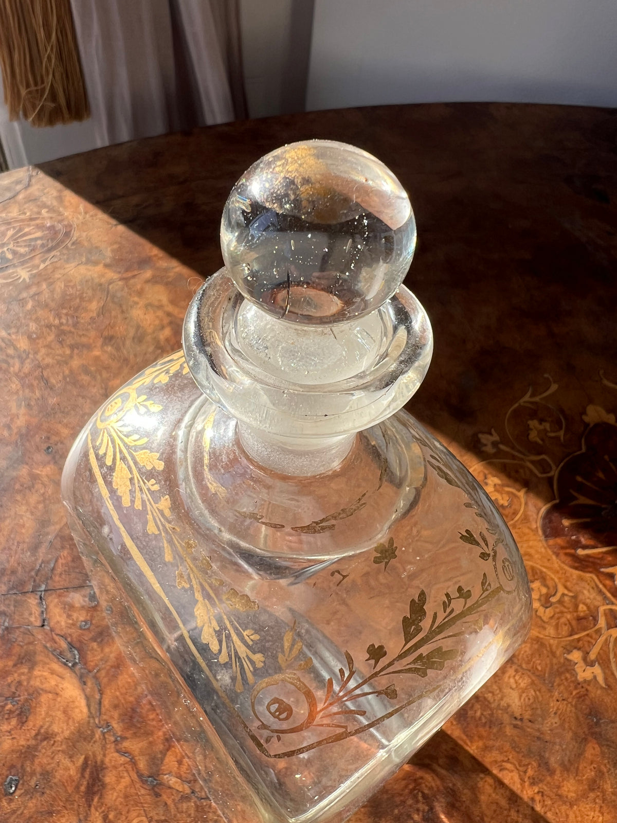 Neoclassical spirit decanter or liqueur bottle with gilt floral motif
