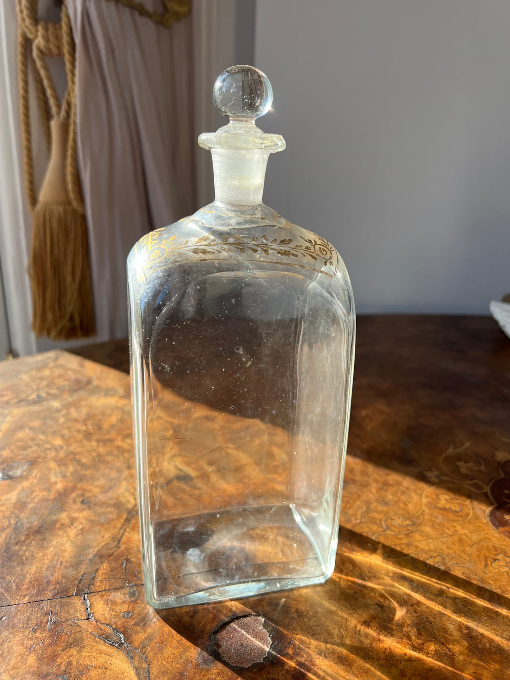 Neoclassical spirit decanter or liqueur bottle with gilt floral motif