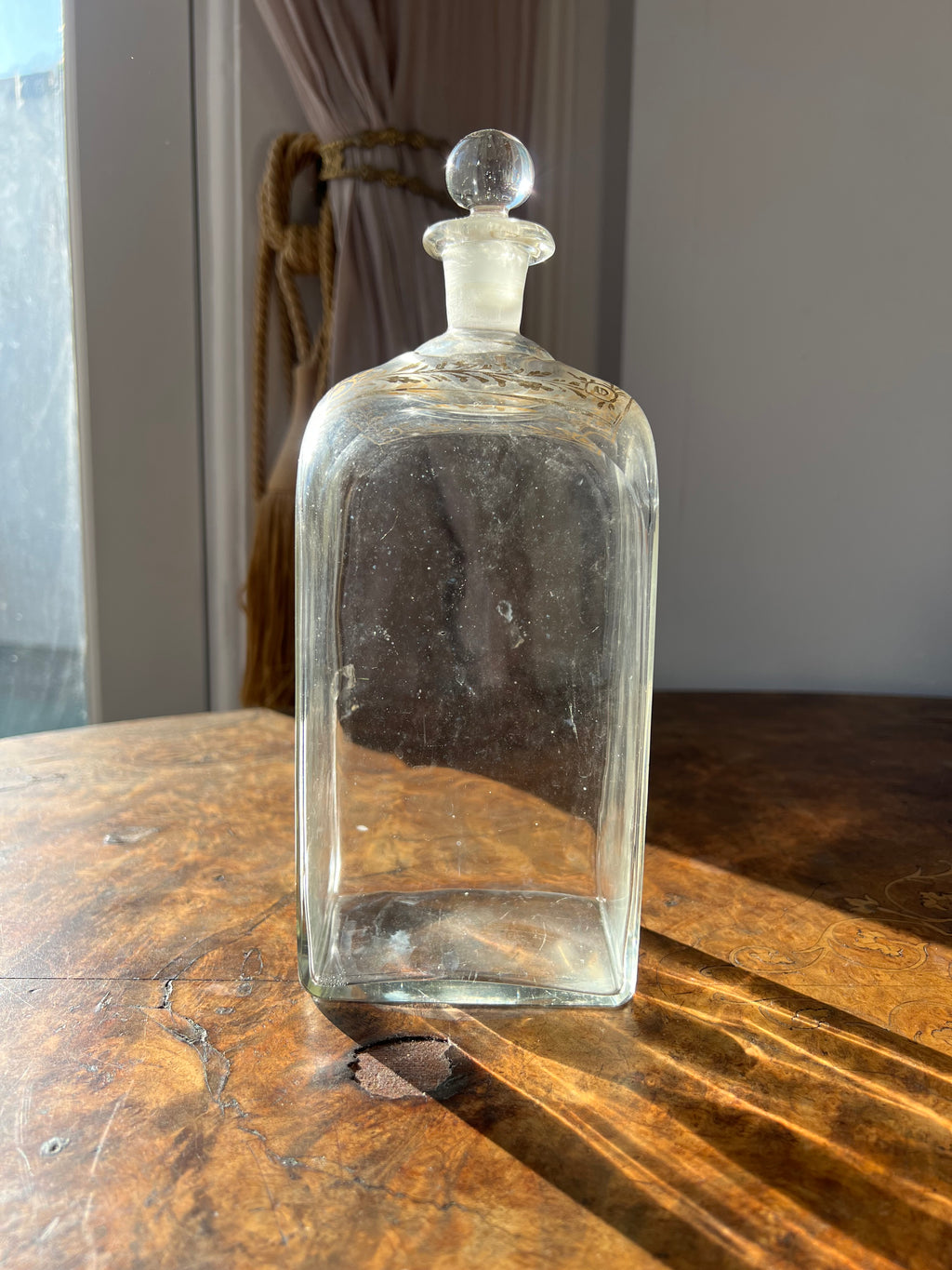 Neoclassical spirit decanter or liqueur bottle with gilt floral motif